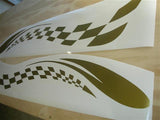 a close up of two racing decals on a wall