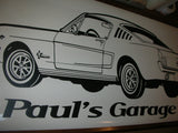 a picture of a car with the words paul's garage on it