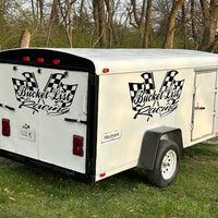 a trailer with a checkered flag painted on it