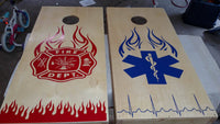 a pair of fire department themed cornhole boards