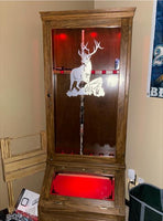 a wooden grandfather clock with a deer on it