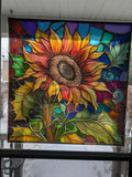 Real photo of a Sticker Chef printed stained glass sunflower cling glowing in a window