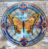 Real photo of a Sticker Chef printed stained glass butterfly cling on a window